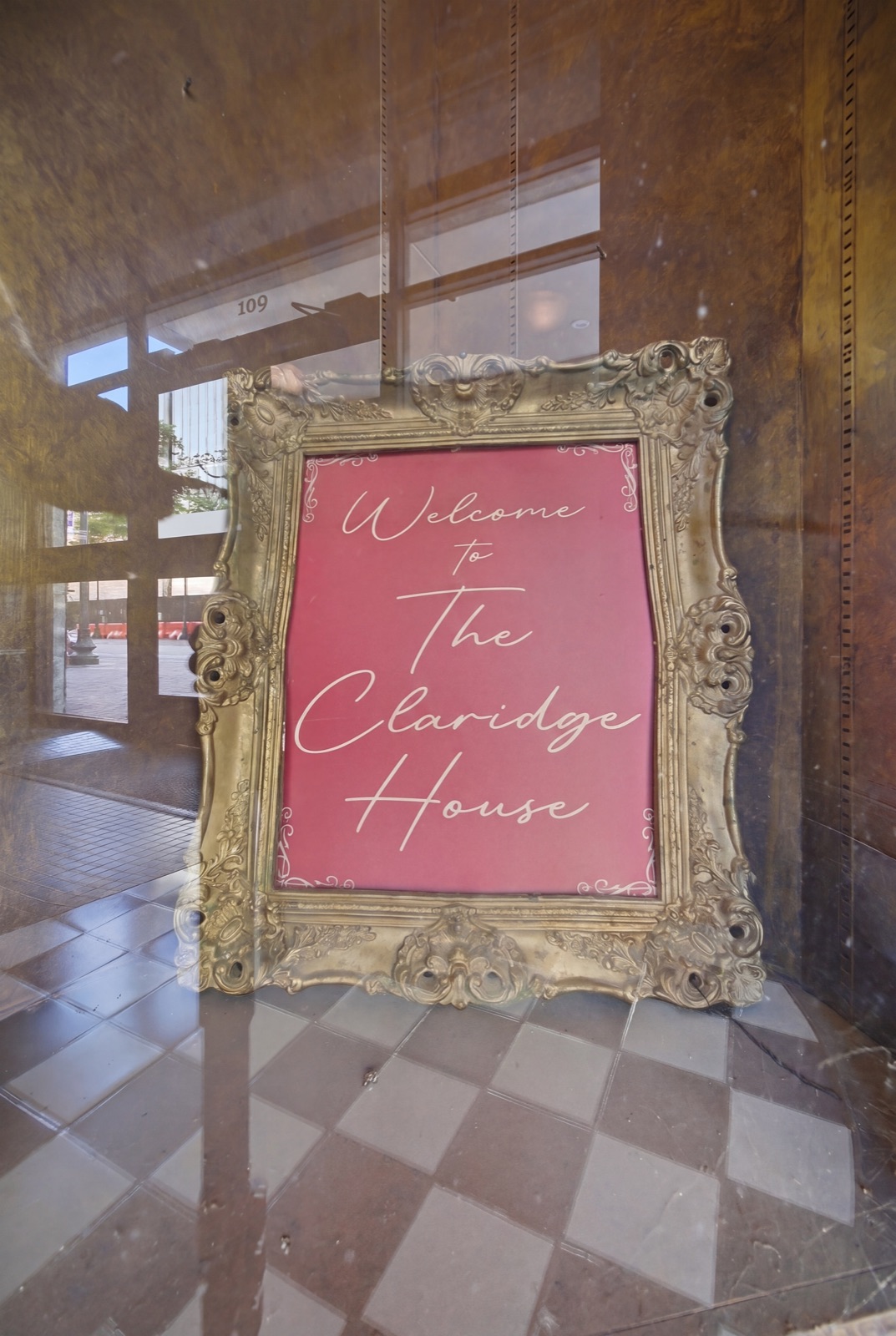 Framed welcome sign in the entry vestibule